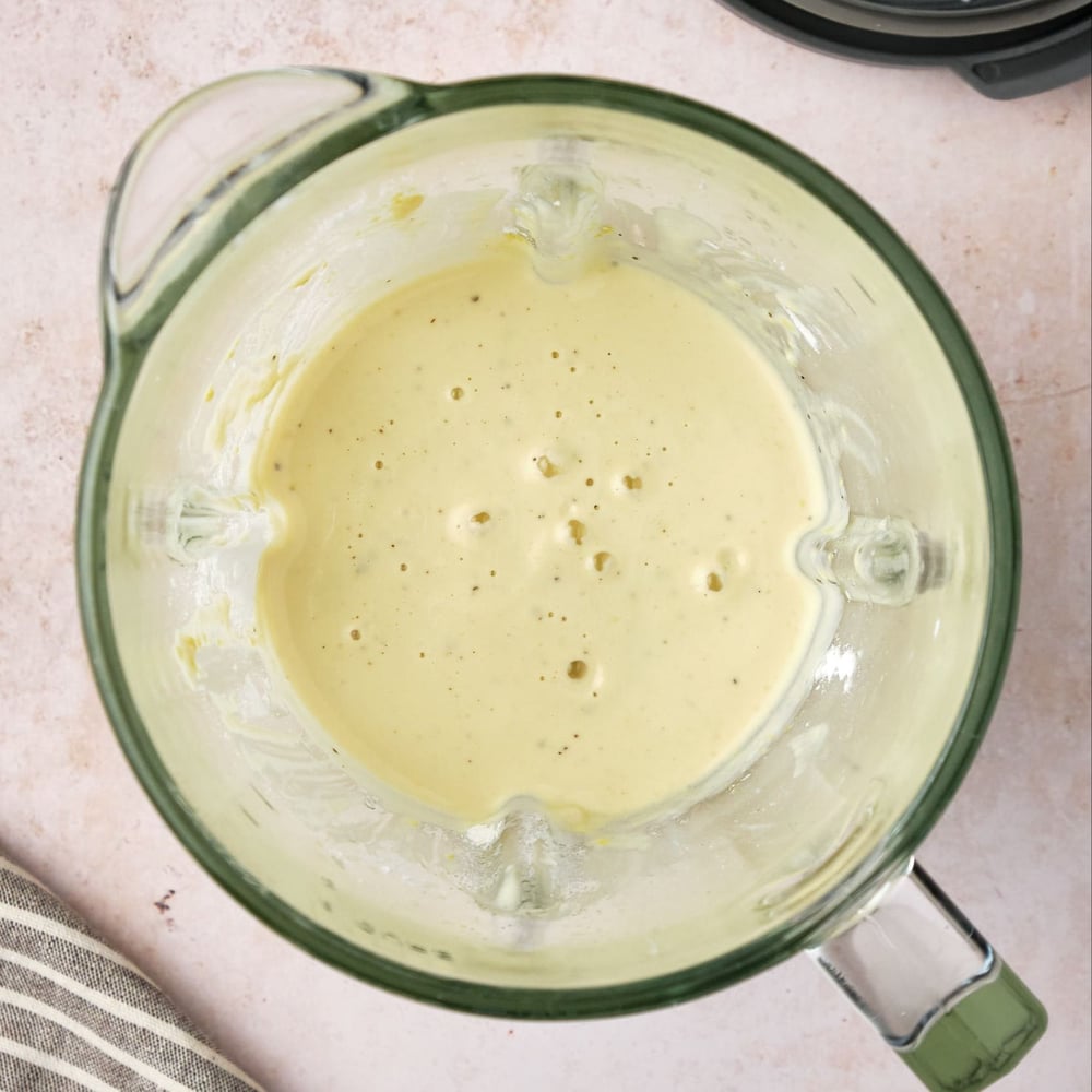 Cashews and water blended in a blender.
