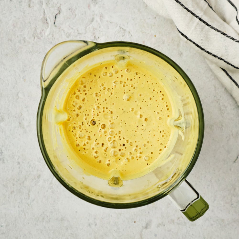 Eggless quiche filling in a blender jar.
