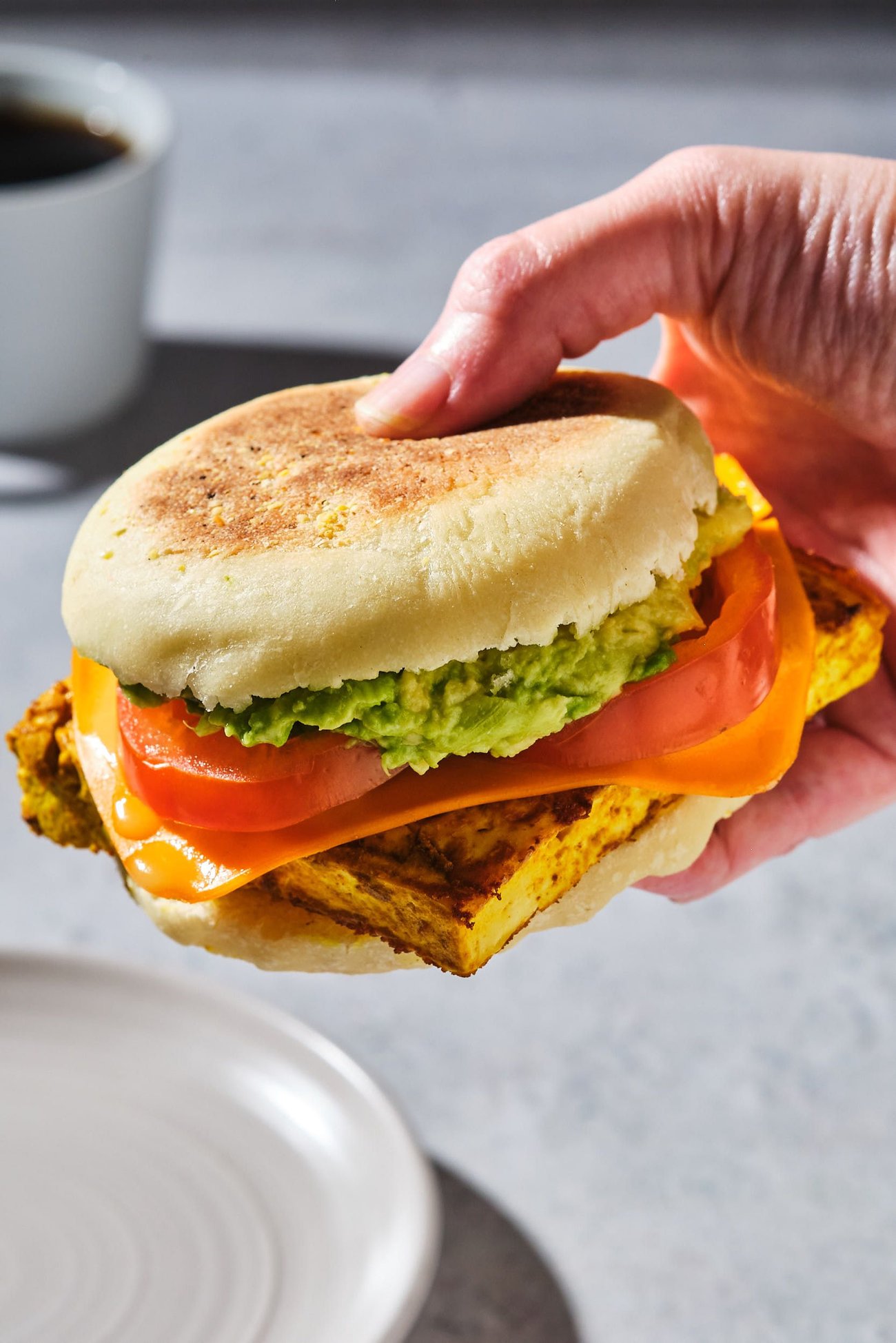 My vegan breakfast sandwich recipe, made using these homemade English muffins.